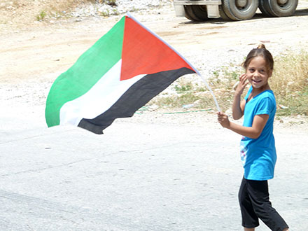 Girl with Palestinian flag, Nabi Saleh
